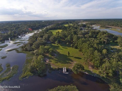 Tucked away where water meets wilderness, this 3-bedroom - photo 31