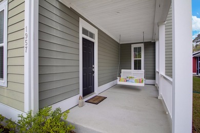 Experience classic Lowcountry living in this freshly-repainted - photo 2