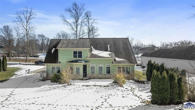 Elegant custom home located in the prestigious Idle Creek