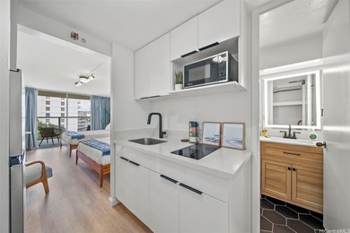 Live in the heart of Waikiki at the iconic Island Colony with - photo 10
