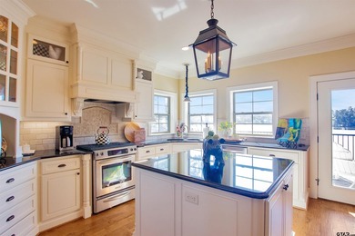 This stunning 4-bedroom, custom built 3408 sq ft lake front home - photo 7