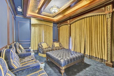 Commanding serene lakefront and double fairway vistas, this - photo 22
