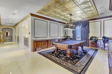 Commanding serene lakefront and double fairway vistas, this - photo 23