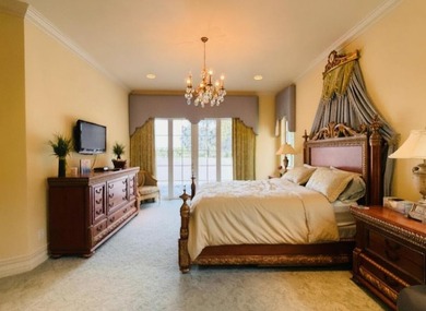 Commanding serene lakefront and double fairway vistas, this - photo 24