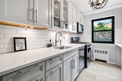 Let this unit sweep you off your feet! True three-bedroom, two - photo 25