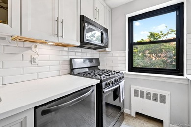 Let this unit sweep you off your feet! True three-bedroom, two - photo 26
