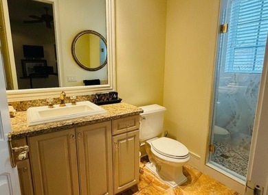 Commanding serene lakefront and double fairway vistas, this - photo 27