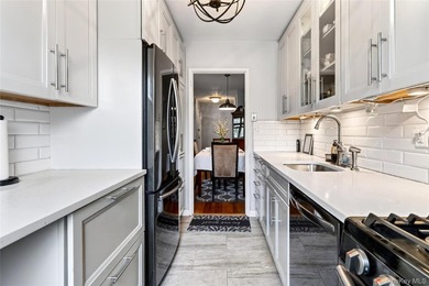 Let this unit sweep you off your feet! True three-bedroom, two - photo 28