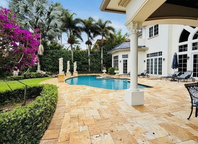 Commanding serene lakefront and double fairway vistas, this - photo 32