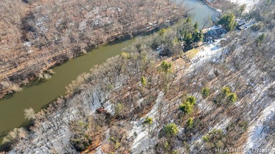 A quiet stretch of riverfront near historic New Richmond. The - photo 3