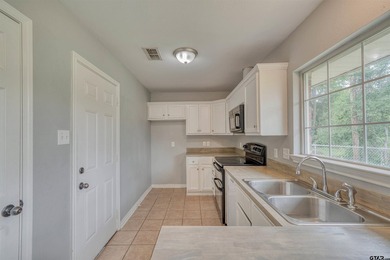 MOVE-IN READY! Updated and well-maintained 3-bedroom, 2-bath - photo 8