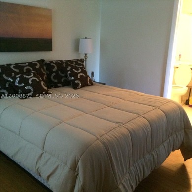 First-floor condo located in a gated golf community with a 24H - photo 8