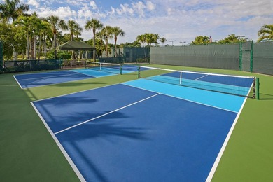 Commanding serene lakefront and double fairway vistas, this - photo 40