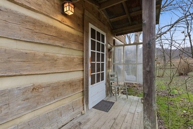 Snug Hollow Farm & Retreat is a rare 290-acre contiguous estate - photo 5