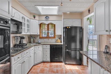 Welcome Home! Introducing this beautifully maintained, spacious - photo 4