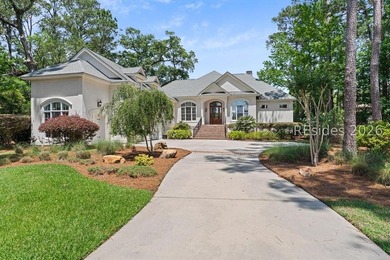 Exceptional custom-built home showcasing unique golf and lagoon - photo 1