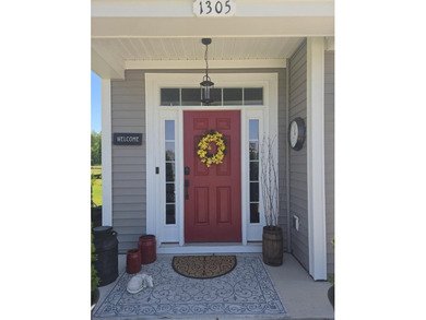 Welcome to 1305 Wykham Park Drive! This professionally designed - photo 3