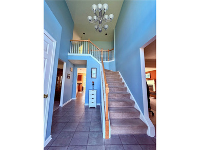 Spacious 4-bedroom, 2.5-bath home featuring a dramatic 2-story - photo 18