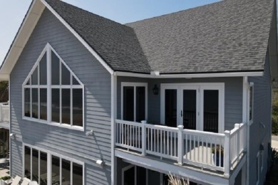Poised atop a picturesque dune, this remarkable home offers - photo 32
