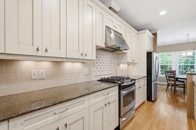 Welcome to 2118 Bay Colony Lane, an elegant 1.5-story brick - photo 14