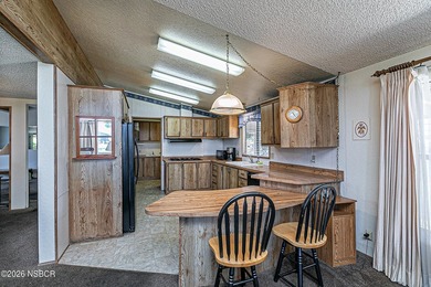 This impressive Triple wide manufactured home on a serene Green - photo 22