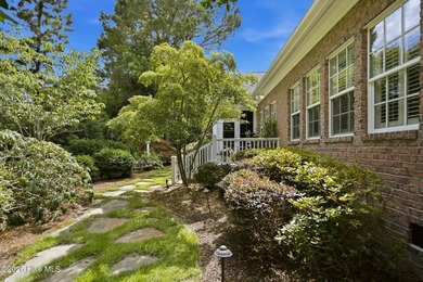 Welcome to 2118 Bay Colony Lane, an elegant 1.5-story brick - photo 49