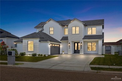 Located in the gated Los Lagos Golf Course community, this home - photo 1