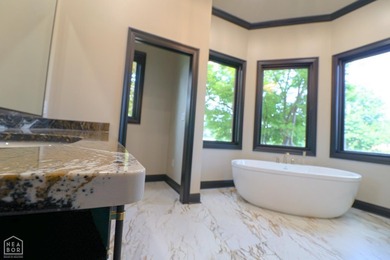 This stunning all-brick home, has been completely remodeled to - photo 32