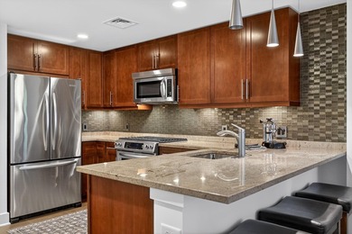 This bright, south-facing 1-bedroom, 1-bath residence at Gulls - photo 8
