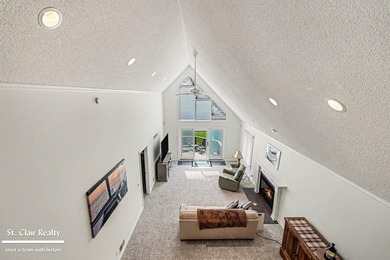 STUNNING WATERFRONT CONDO! Enjoy breathtaking lake views from - photo 8