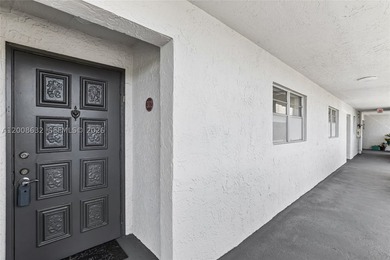 Welcome to this well-maintained condo located at 5900 NW 44th St - photo 3