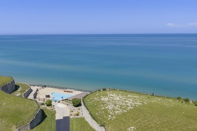 This 20,000-square-foot lot overlooking Lake Michigan is part of - photo 4