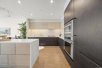 Welcome to Savina #2706, where modern luxury meets coastal urban - photo 3