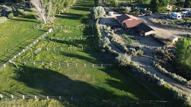 A rare riverfront retreat, tucked away and truly private. Set on - photo 1