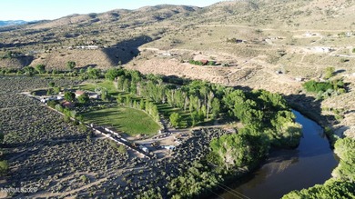 A rare riverfront retreat, tucked away and truly private. Set on - photo 8