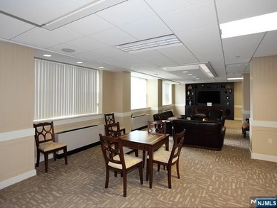 Bright, west facing 2 BR, 2 Bath coop in the heart of Fort Lee - photo 7