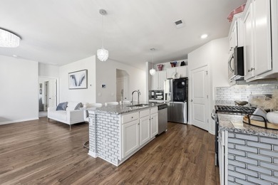 Welcome to 512 Latigo Way, a spacious 5-bedroom, 3.5-bath home - photo 8