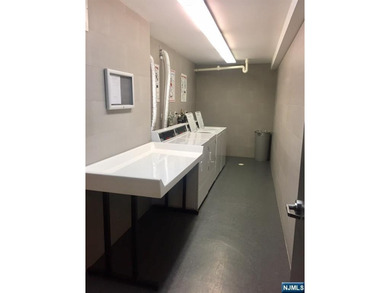 Bright, west facing 2 BR, 2 Bath coop in the heart of Fort Lee - photo 9