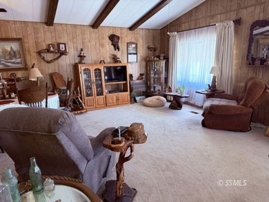 This inviting 1984 manufactured home, set on a permanent - photo 8