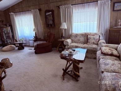 This inviting 1984 manufactured home, set on a permanent - photo 9