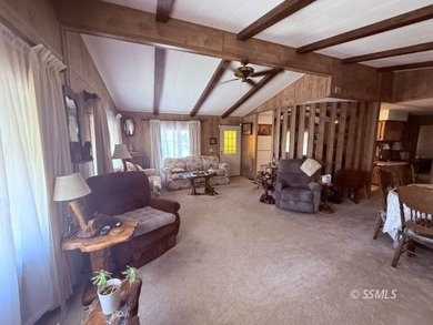 This inviting 1984 manufactured home, set on a permanent - photo 10