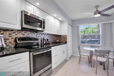 Lake Condo For Sale in Coconut Creek, Florida