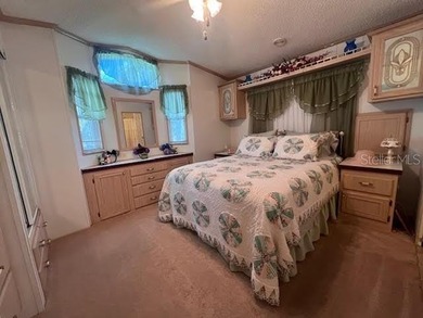 This a 55+ (gated) community. Lovely waterfront 2 bedroom (or - photo 13