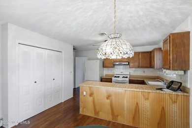 Welcome to this well-maintained 2-BR 2-BA home located in the - photo 13