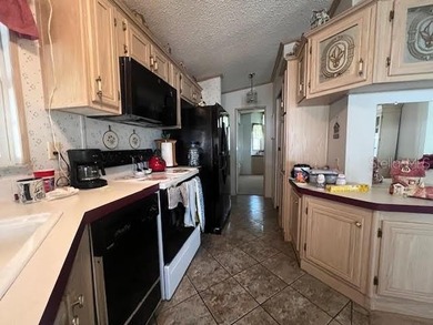 This a 55+ (gated) community. Lovely waterfront 2 bedroom (or - photo 14