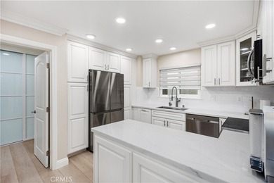 YOU WILL NOT WANT TO MISS THIS BEAUTIFULLY REMODELED GARDEN