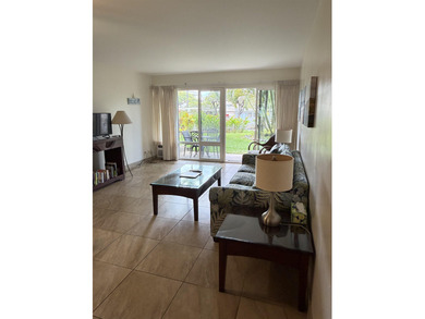 GROUND FLOOR UNIT!! Walk out onto the lanai, into the garden, to - photo 9