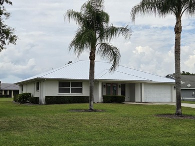 NEW METAL ROOF! Tucked away on a peaceful half-acre lot just - photo 2