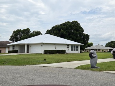 NEW METAL ROOF! Tucked away on a peaceful half-acre lot just - photo 3