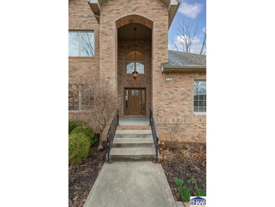 Nestled in the wooded beauty of Idle Creek Golf Community, this